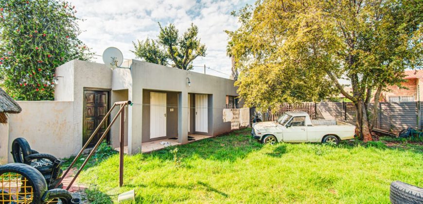 WHY PAY SOMEONE’S BOND?!!! BEAUTIFUL HOME WITH A COTTAGE FOR EXTRA INCOME