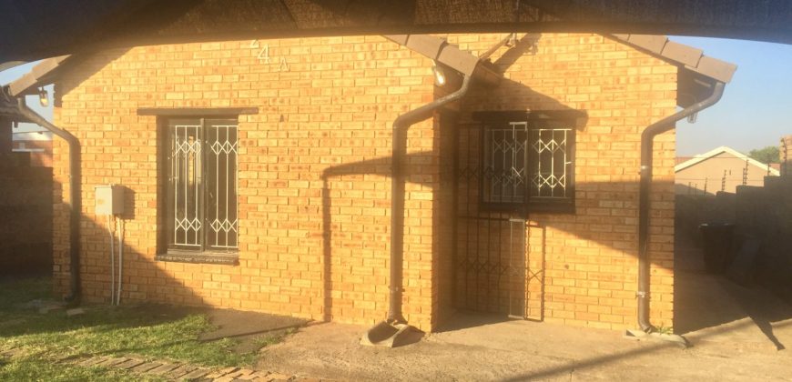 A 3 bedroom house with 2 outside cottages for extra income