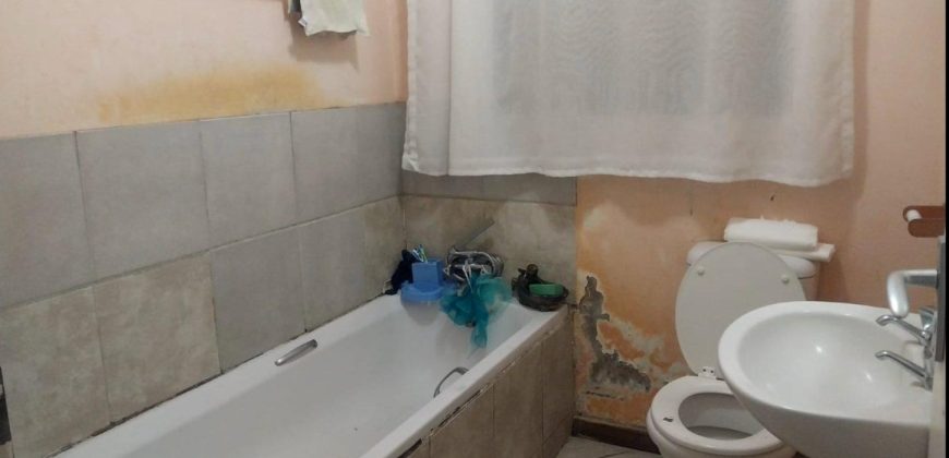 A 3 bedroom house with 3 rental rooms for sale in Clayville